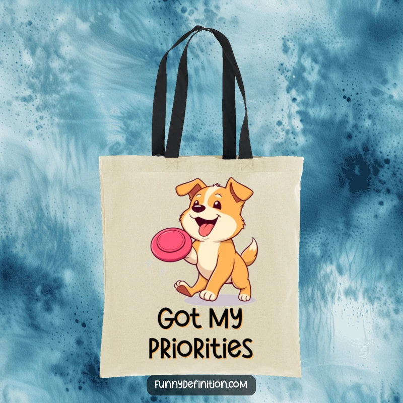 Funny dog tote bag featuring a happy dog with tongue out, leaping to catch a frisbee mid-air, ideal for park trips.