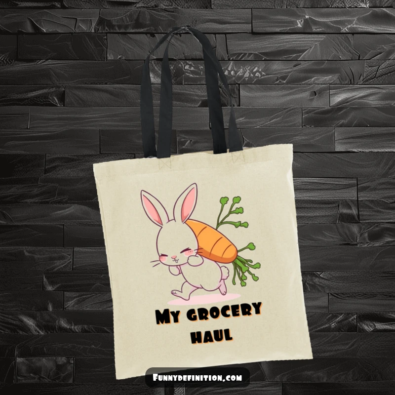 Funny rabbit tote bag showing a comically struggling rabbit leaning forward under the weight of a huge carrot, perfect for carrying essentials.